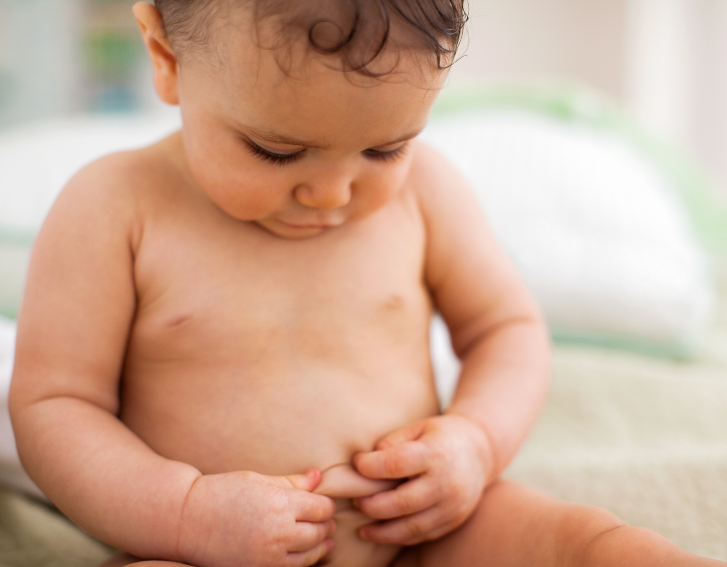 Baby exploring her belly | Commercial Kids Photographer