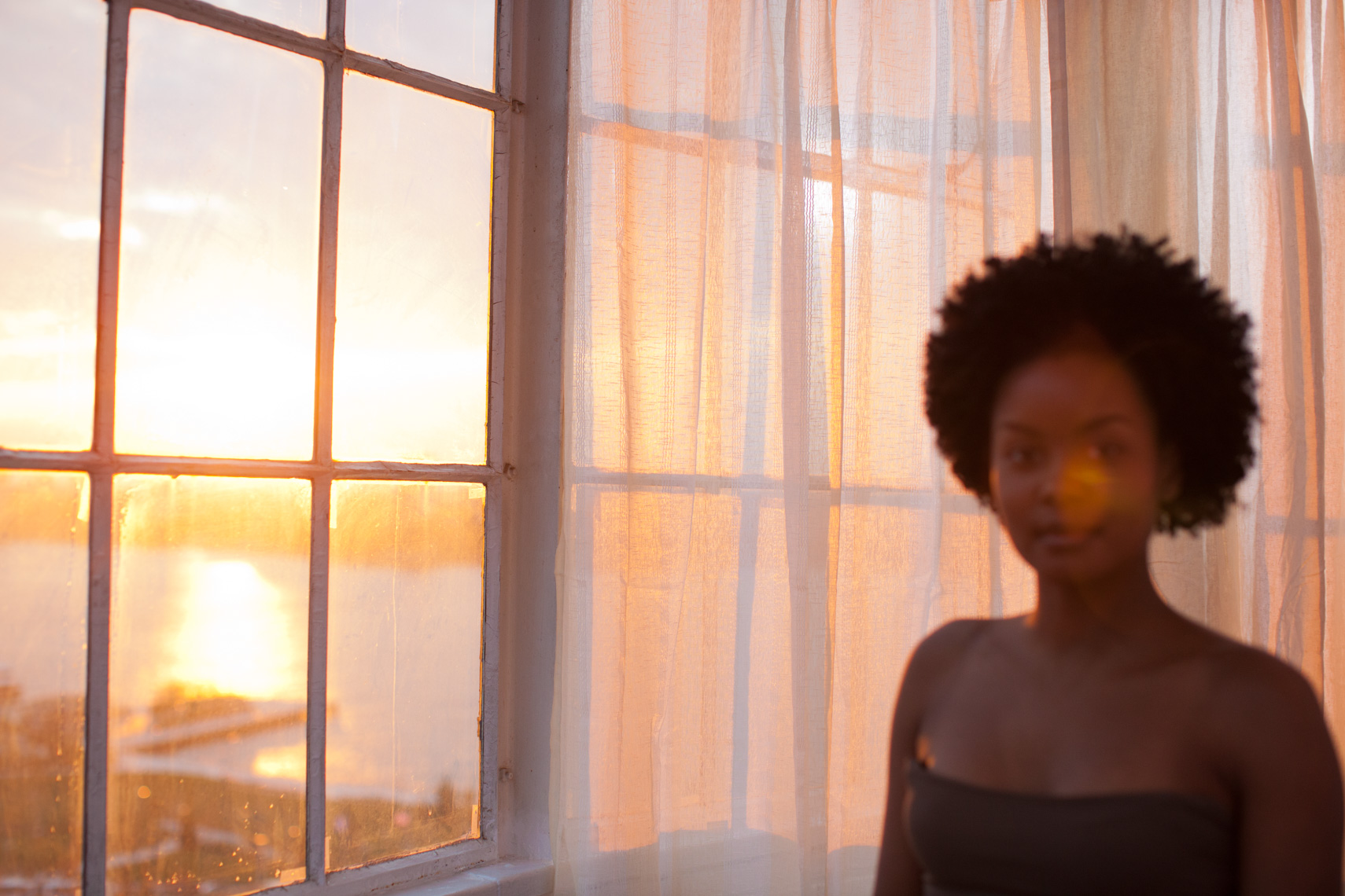 Beautiful woman NYC  window |  Visual Storytelling Photographer