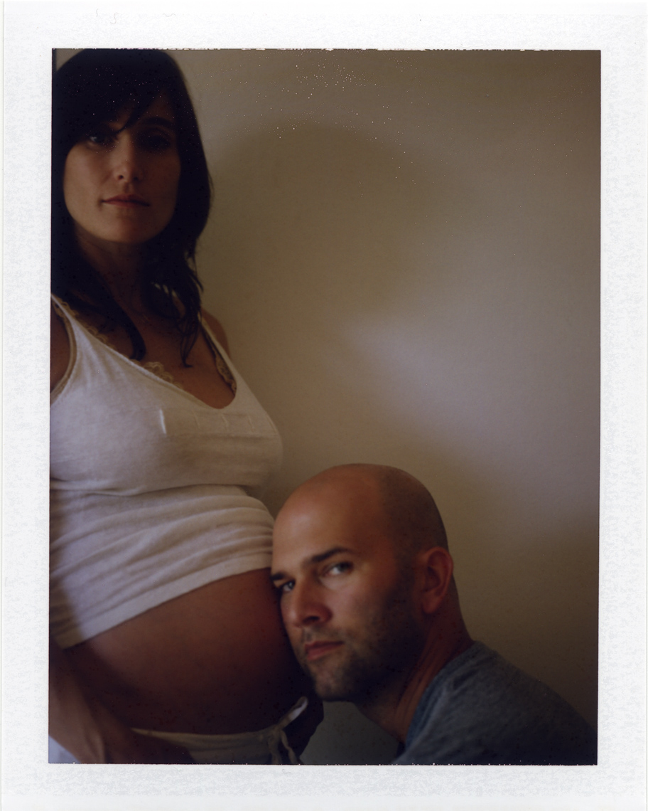 Intimate pregnant couple  | Photographer using Polaroid