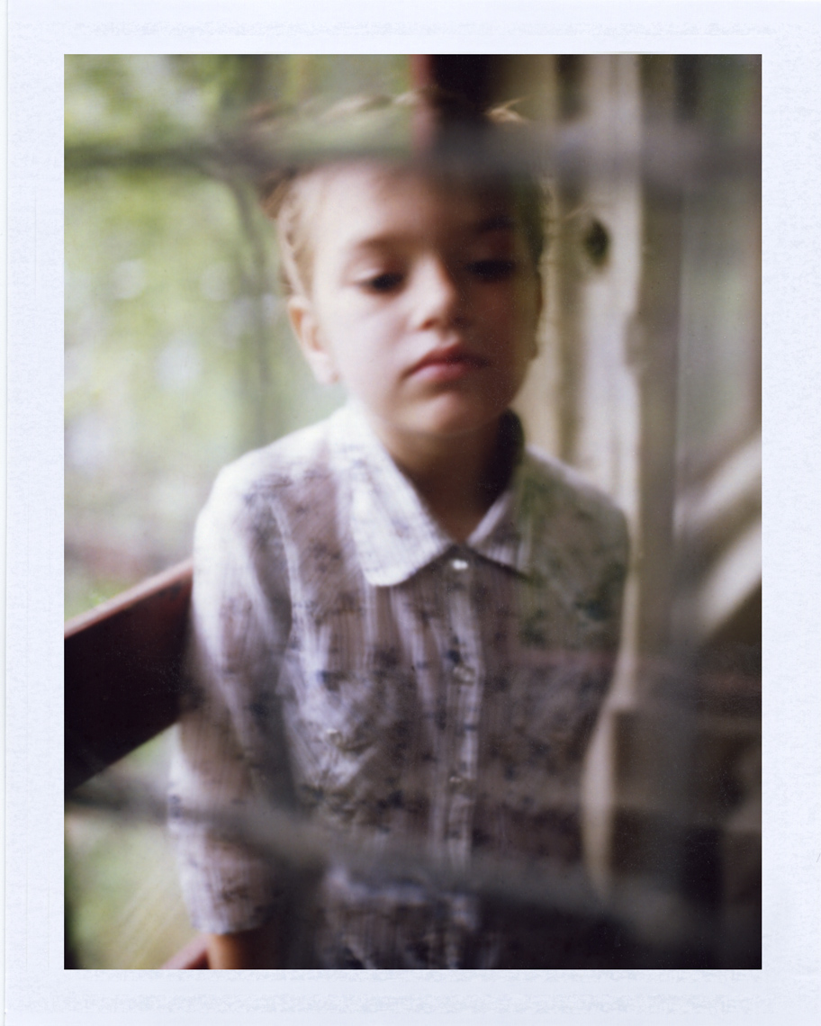 irl behind window | Polaroid Photographers