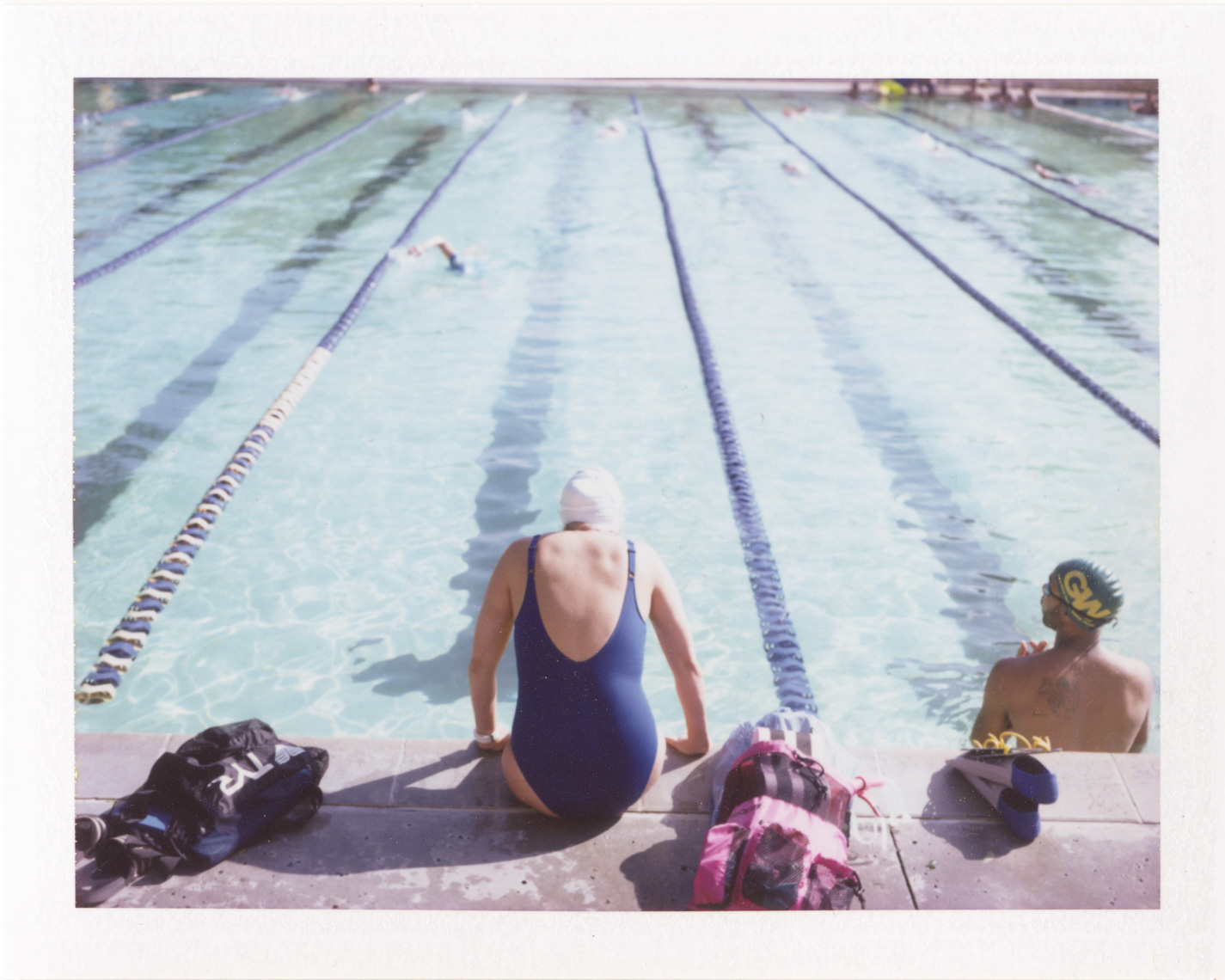 Woman swimmer in public pool | Photographers who shoot film