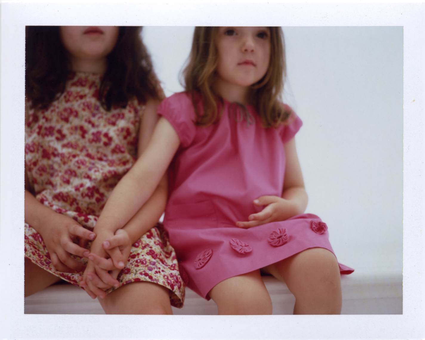 Sisters in soft pink | Photographers using film