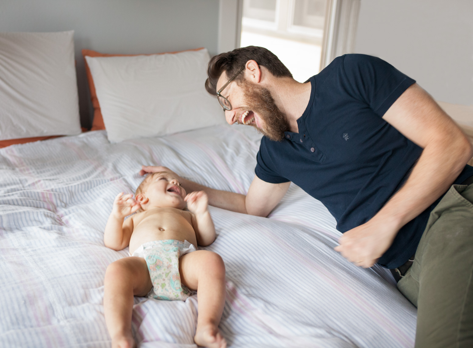 Fun loving dad with baby | Commercial Lifestyle Photographer