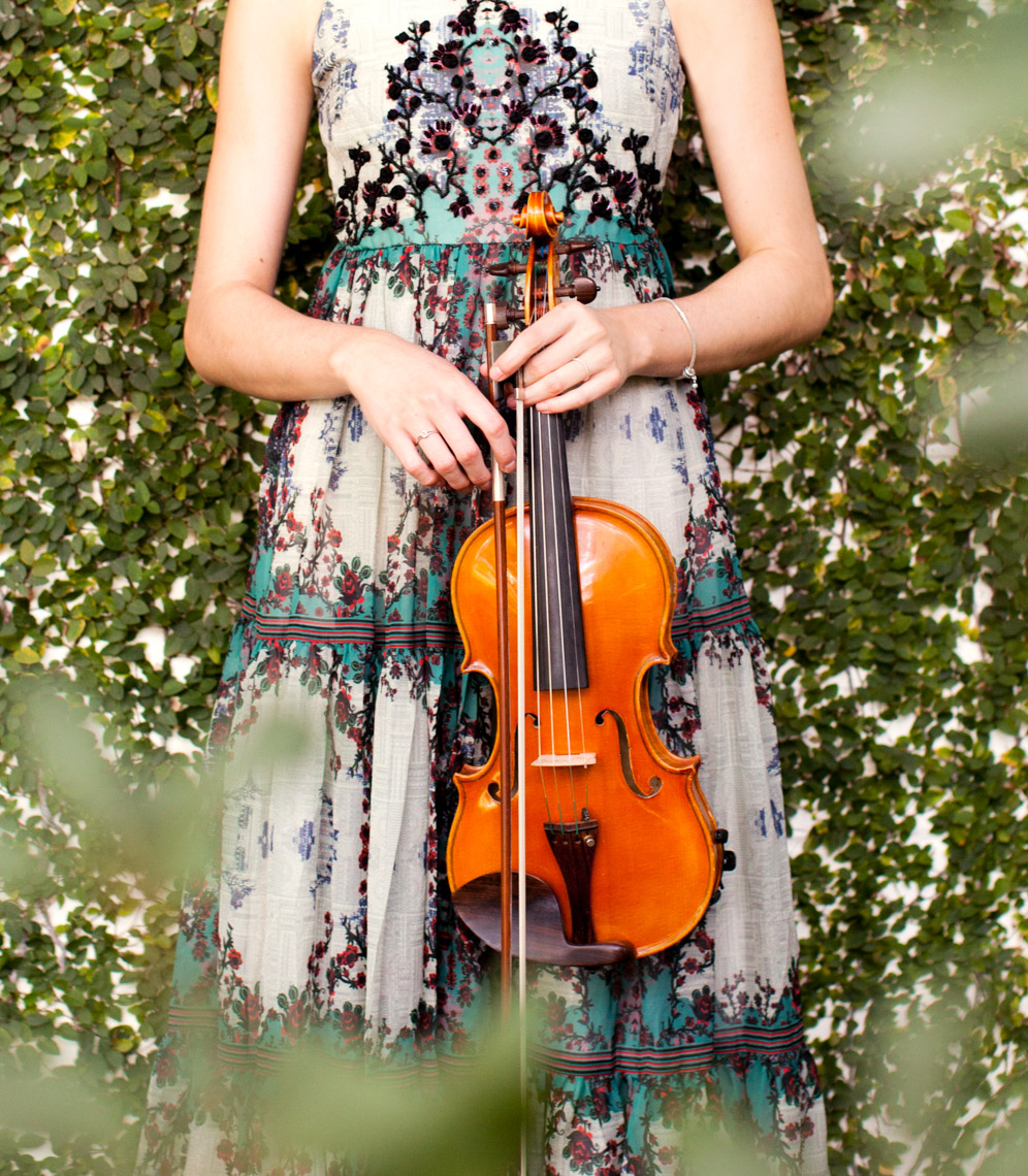 Teen girl holding violin | Visual Storytelling Photographer