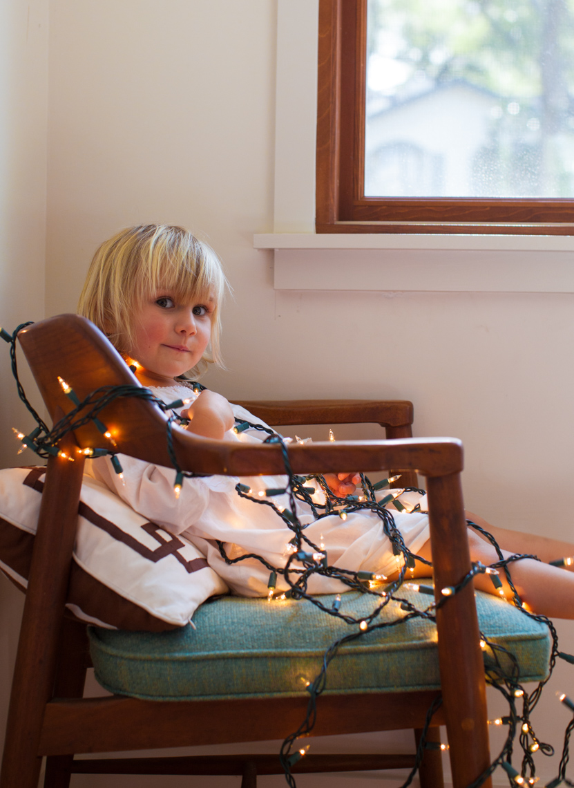 Playful child holiday light  | Commercial Lifestyle Photographer