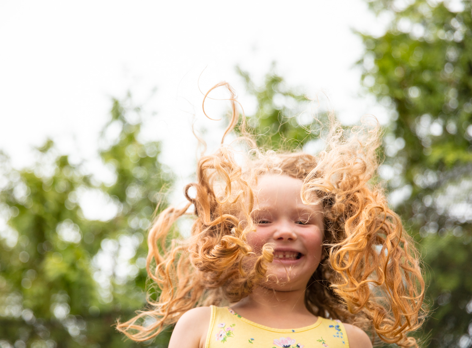 Cheerful child jumping | Kids Lifestyle Photographer