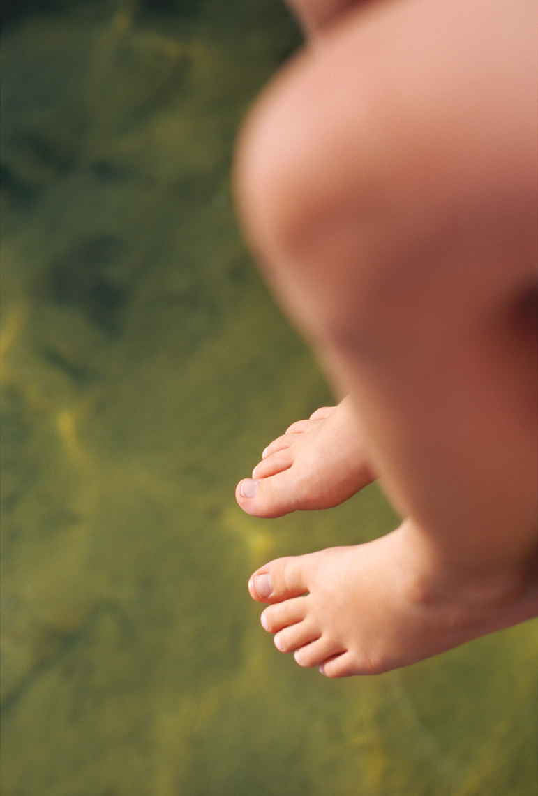 Feet hanging from dock  | Kids Lifestyle Photographer
