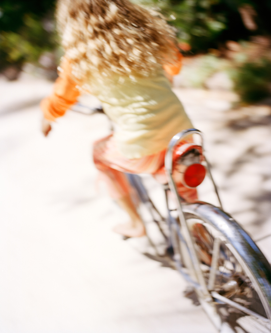 Girl riding vintage bike | Kids Lifestyle Photographer