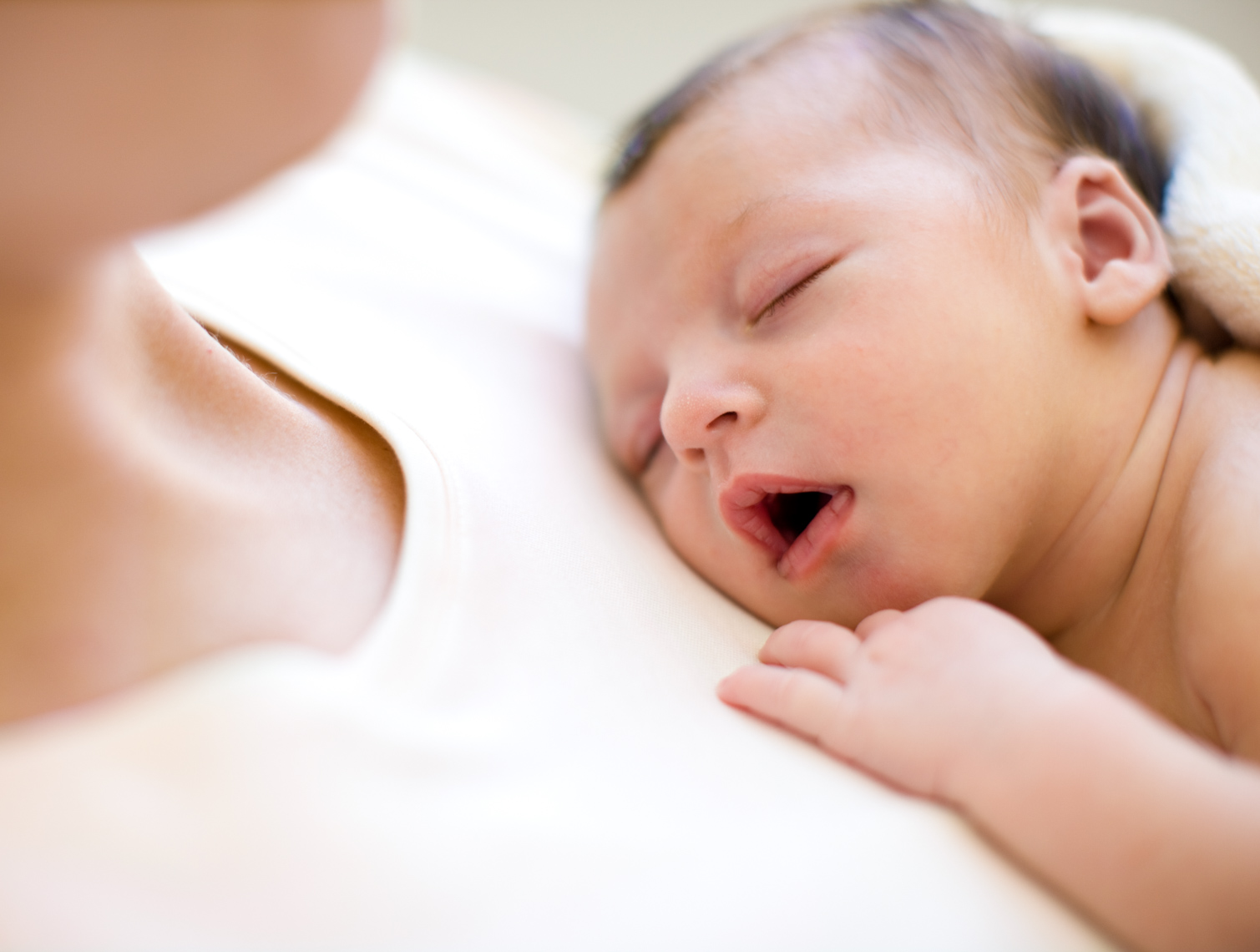 Cozy newborn sleeping | Commercial Kids Photographer