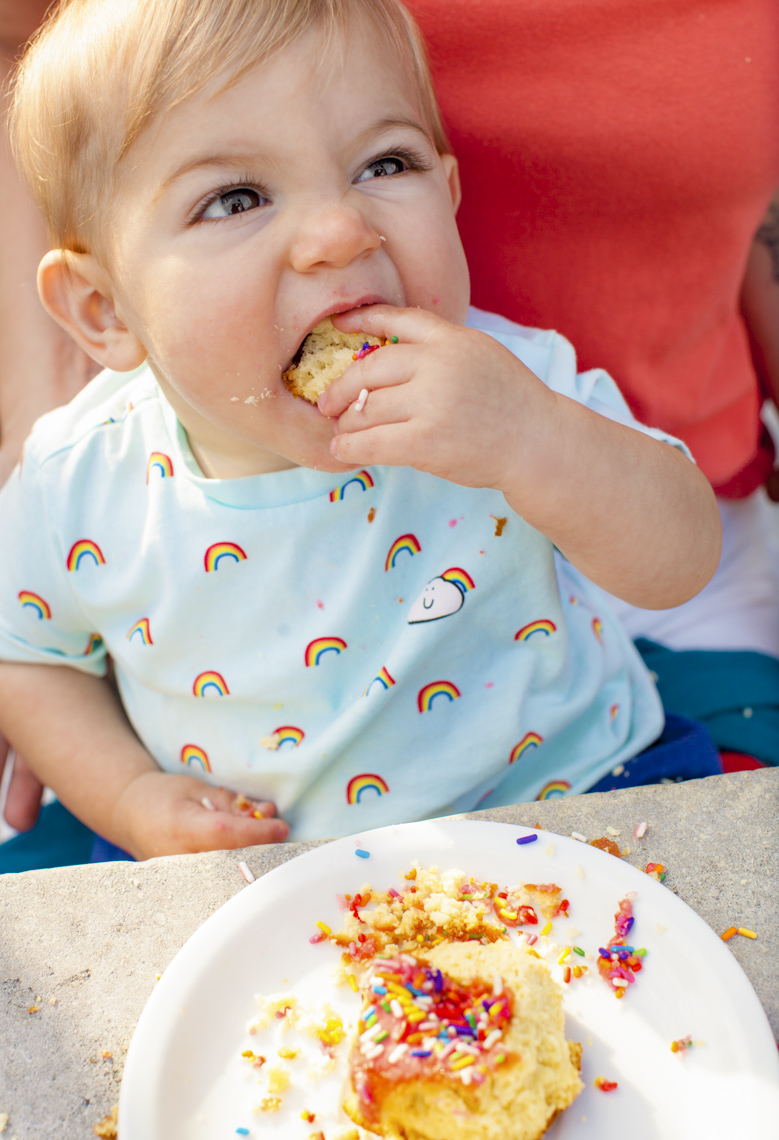 Excited baby eating donut | Commercial Lifestyle Photographer