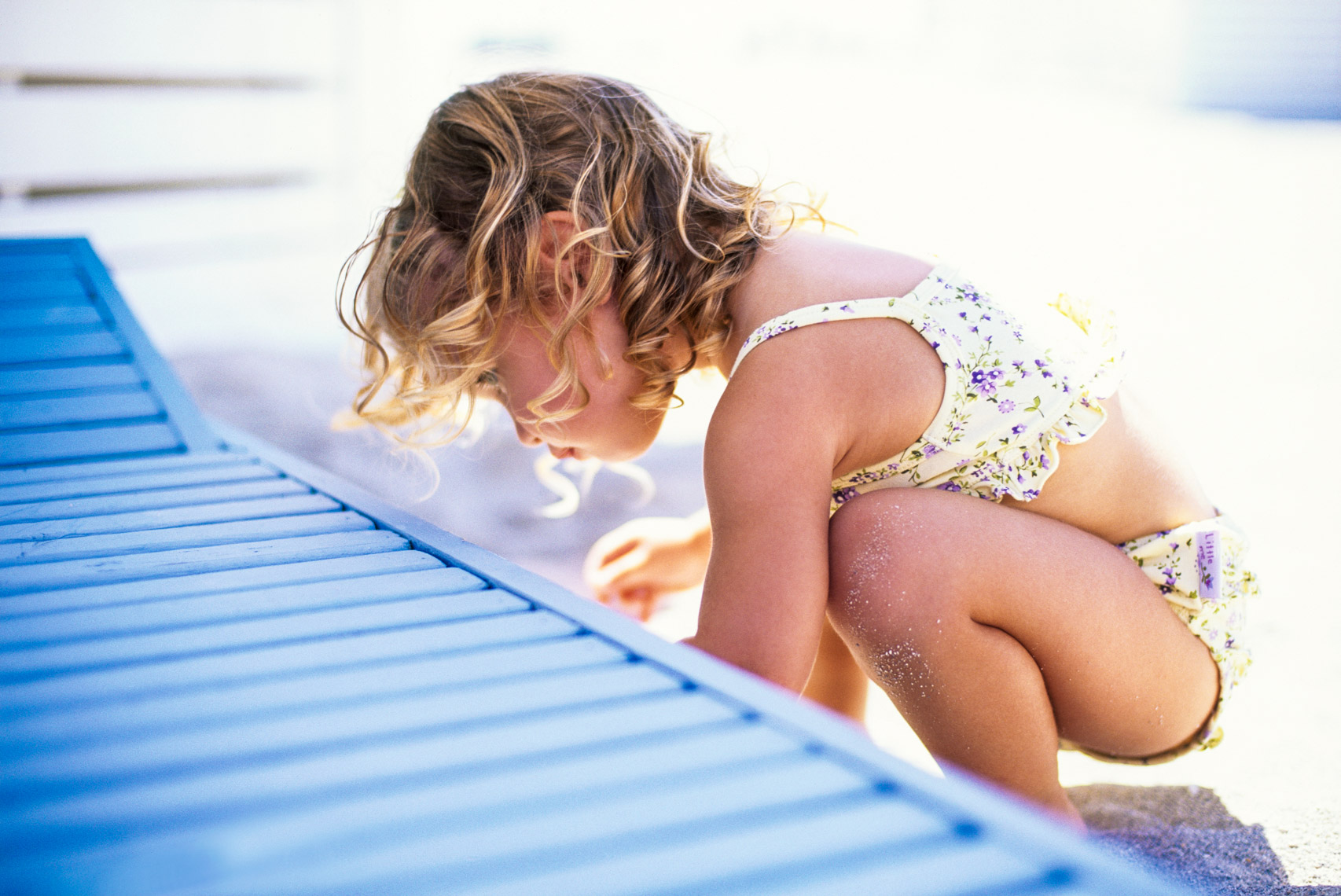 Curious child exploring beach | Kids Lifestyle Photographer