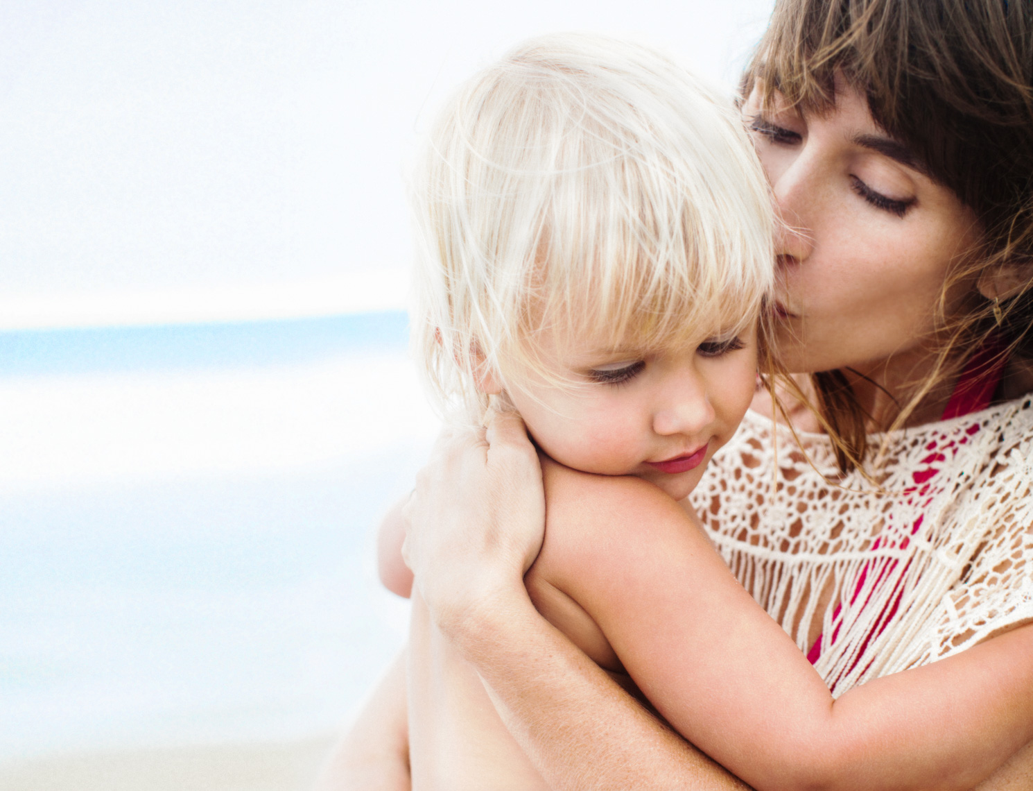 Child and mom on beach | Commercial Lifestyle Photographer