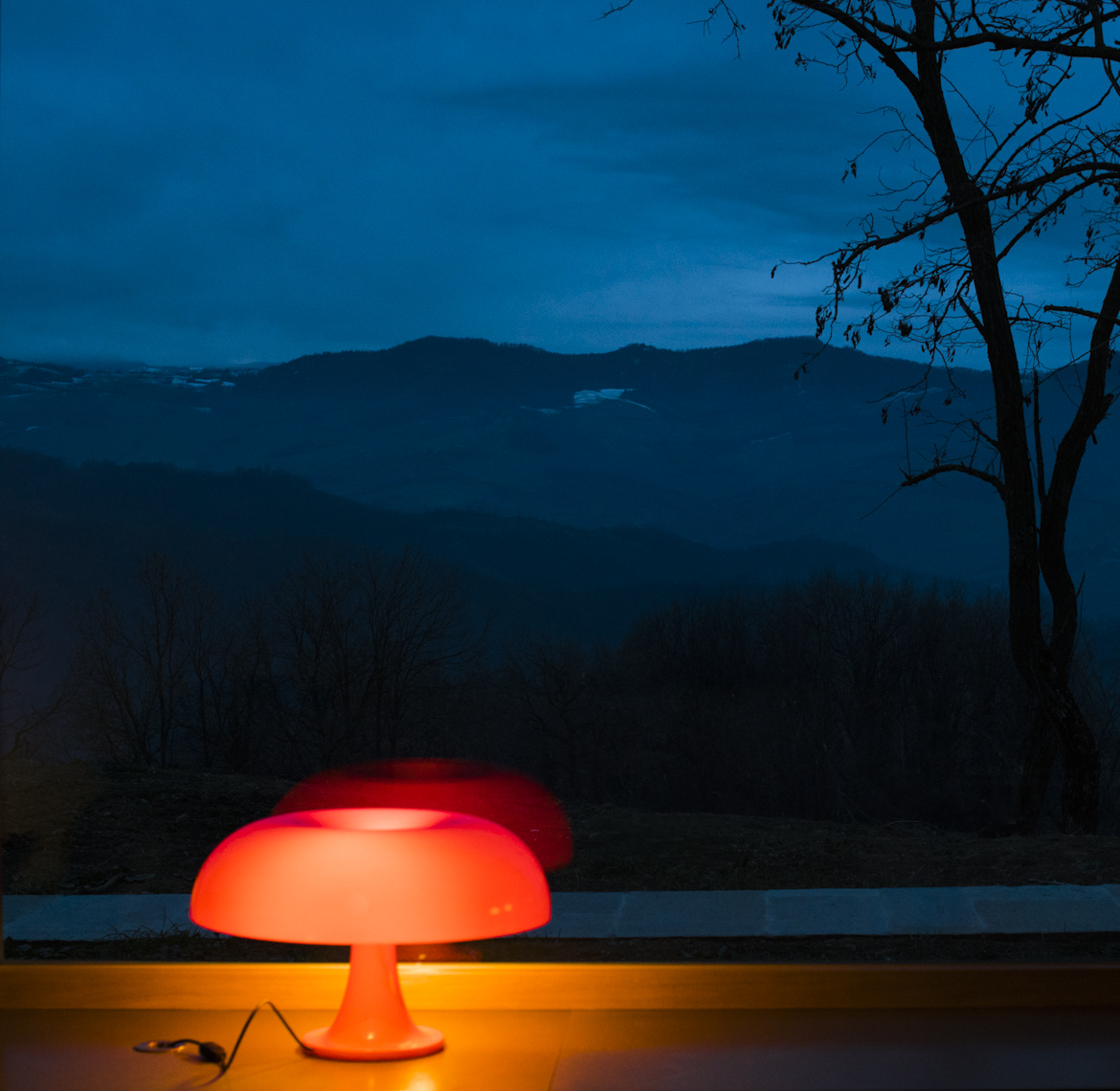 Glowing window lamp | Editorial Travel Photographer