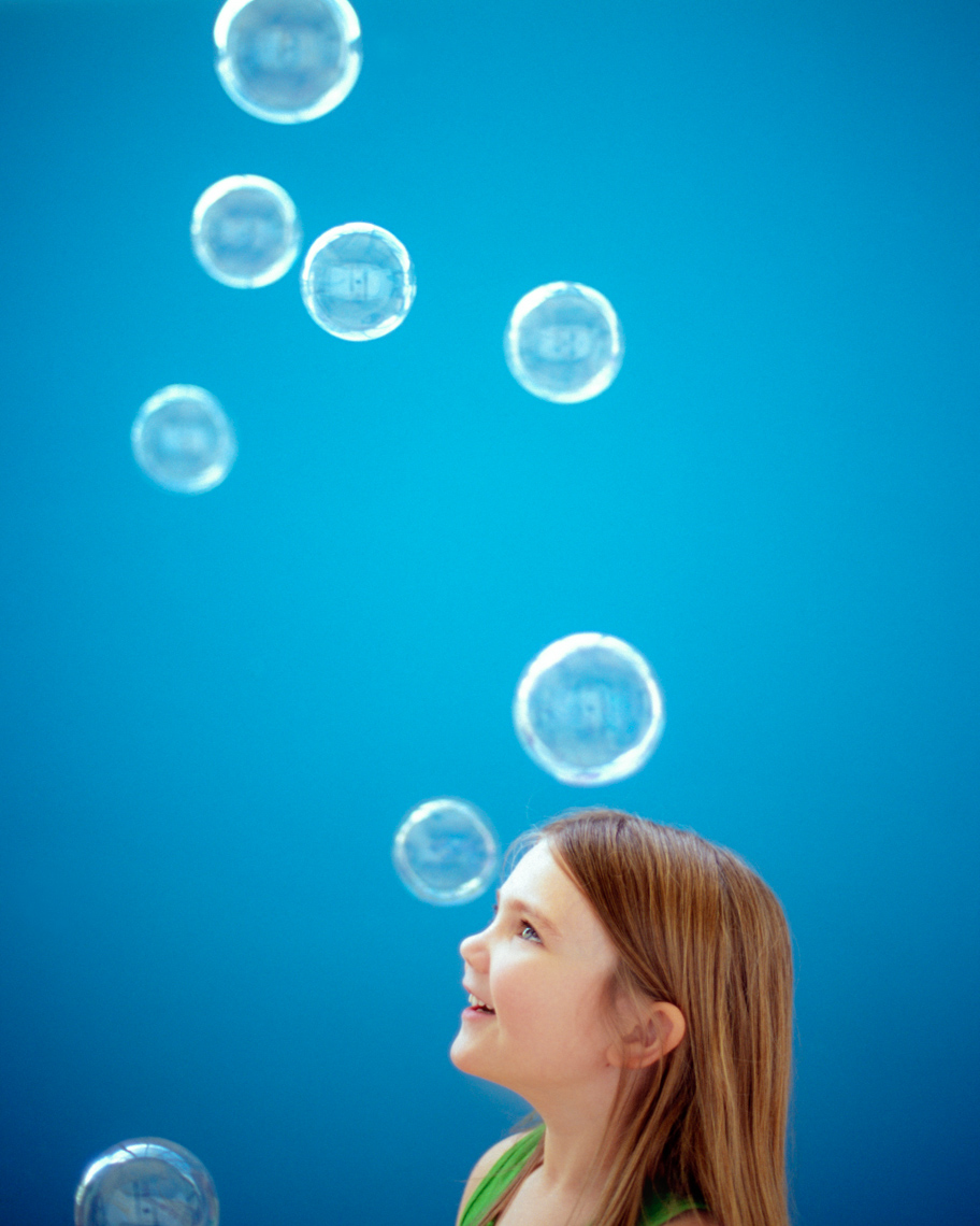 Blowing blue bubbles | Kids Lifestyle Photographer