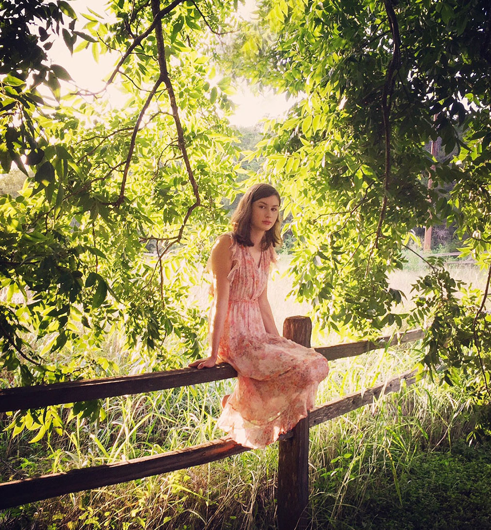 Teen girl sitting on fence  | Austin Lifestyle Photographer
